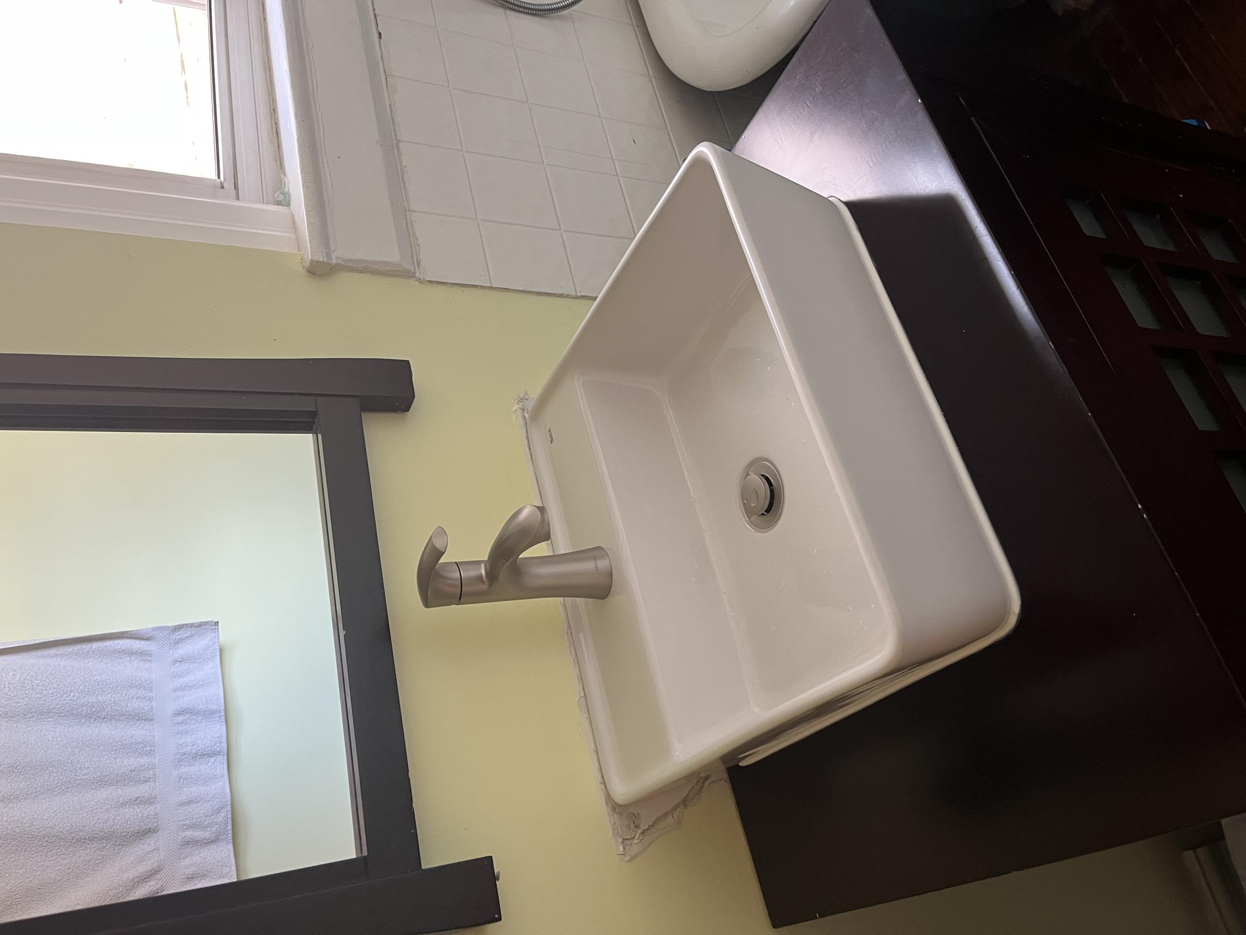 install customer supplied basin sink & faucet, and supply & install new bath tap