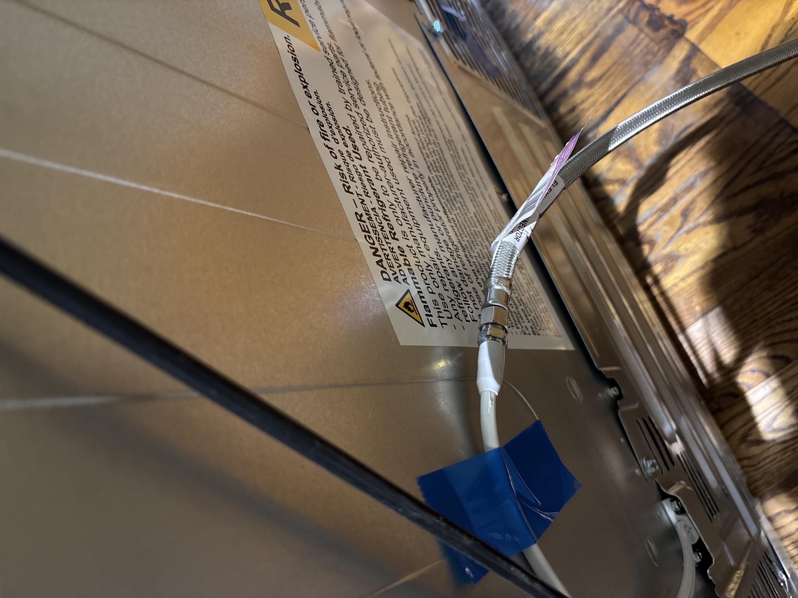 Hookup new refrigerator to water supply line