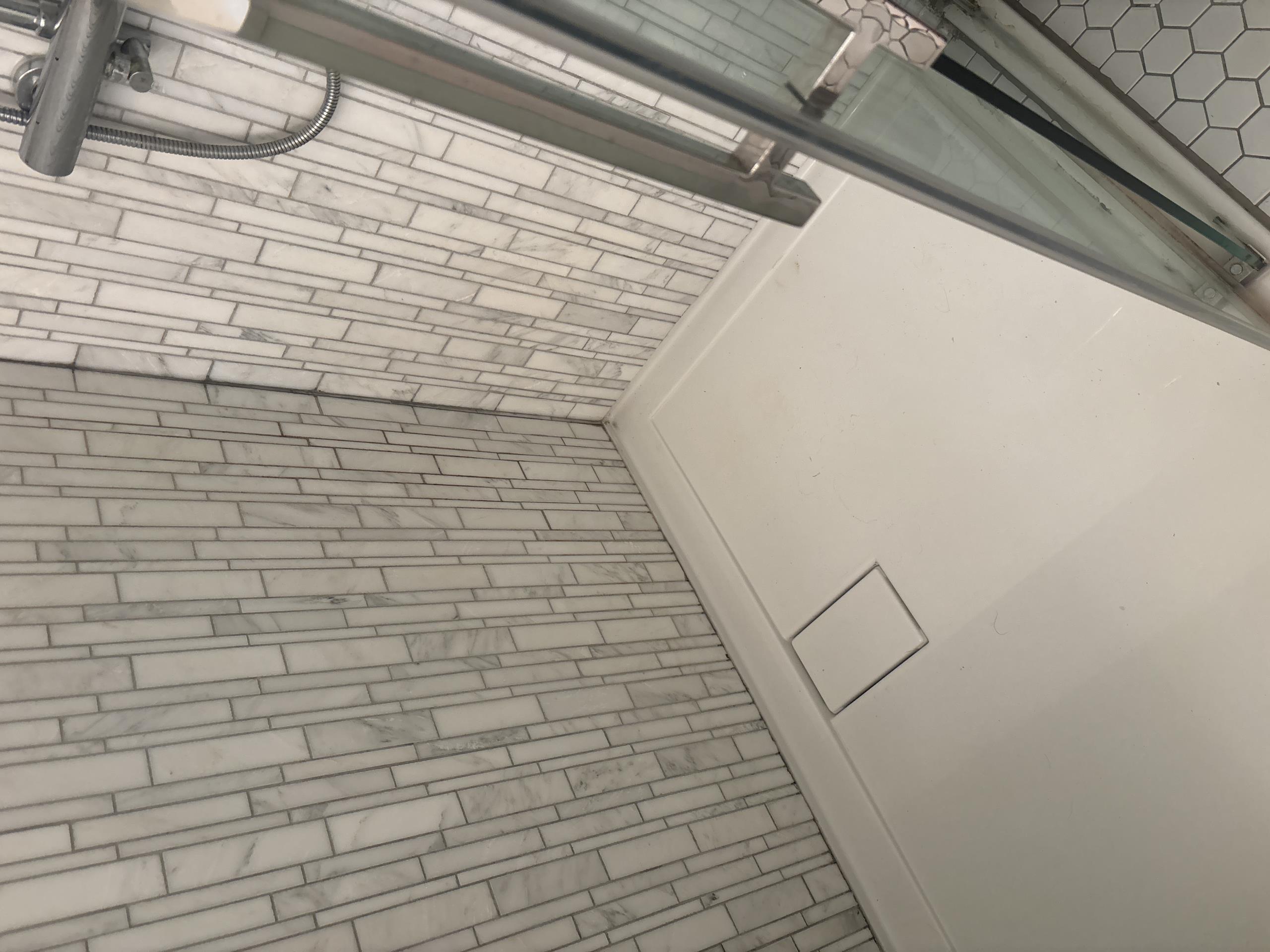 recaulking 2 showers