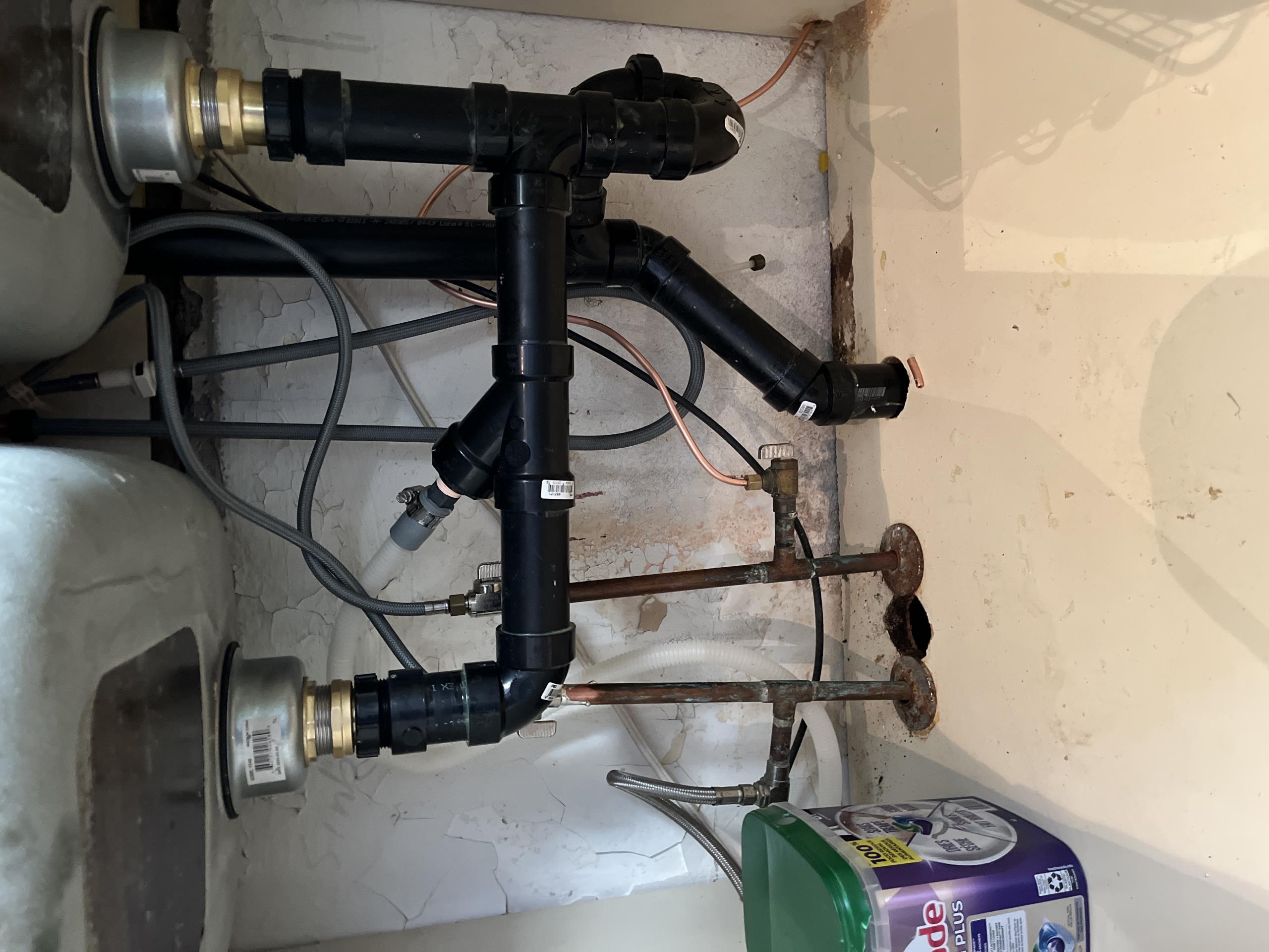 Old Toronto, ON - Replaced smelly kitchen sink drain and broken fridge icemaker tubing. 
