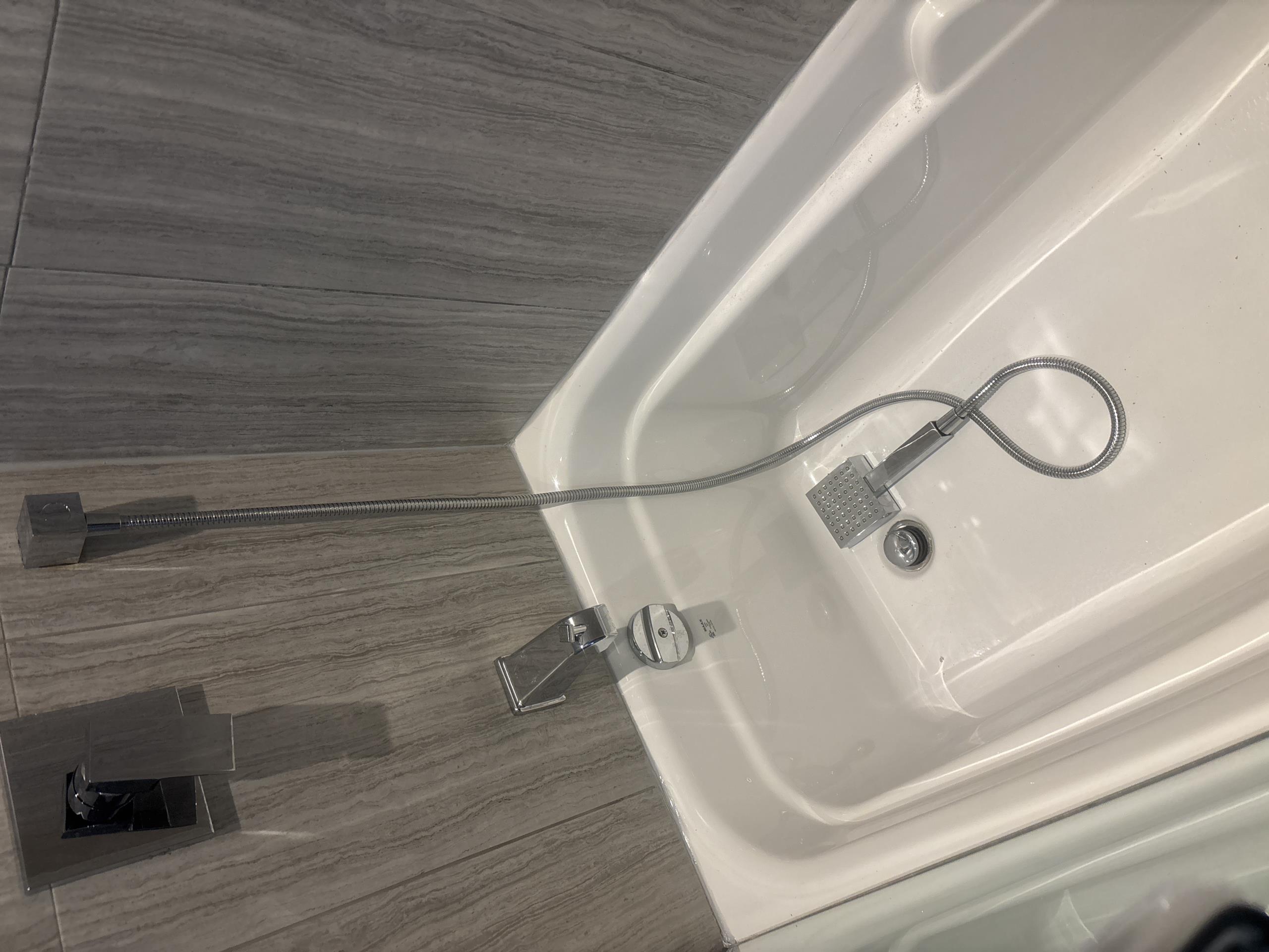 Old Toronto, ON - shower leaking through ceiling