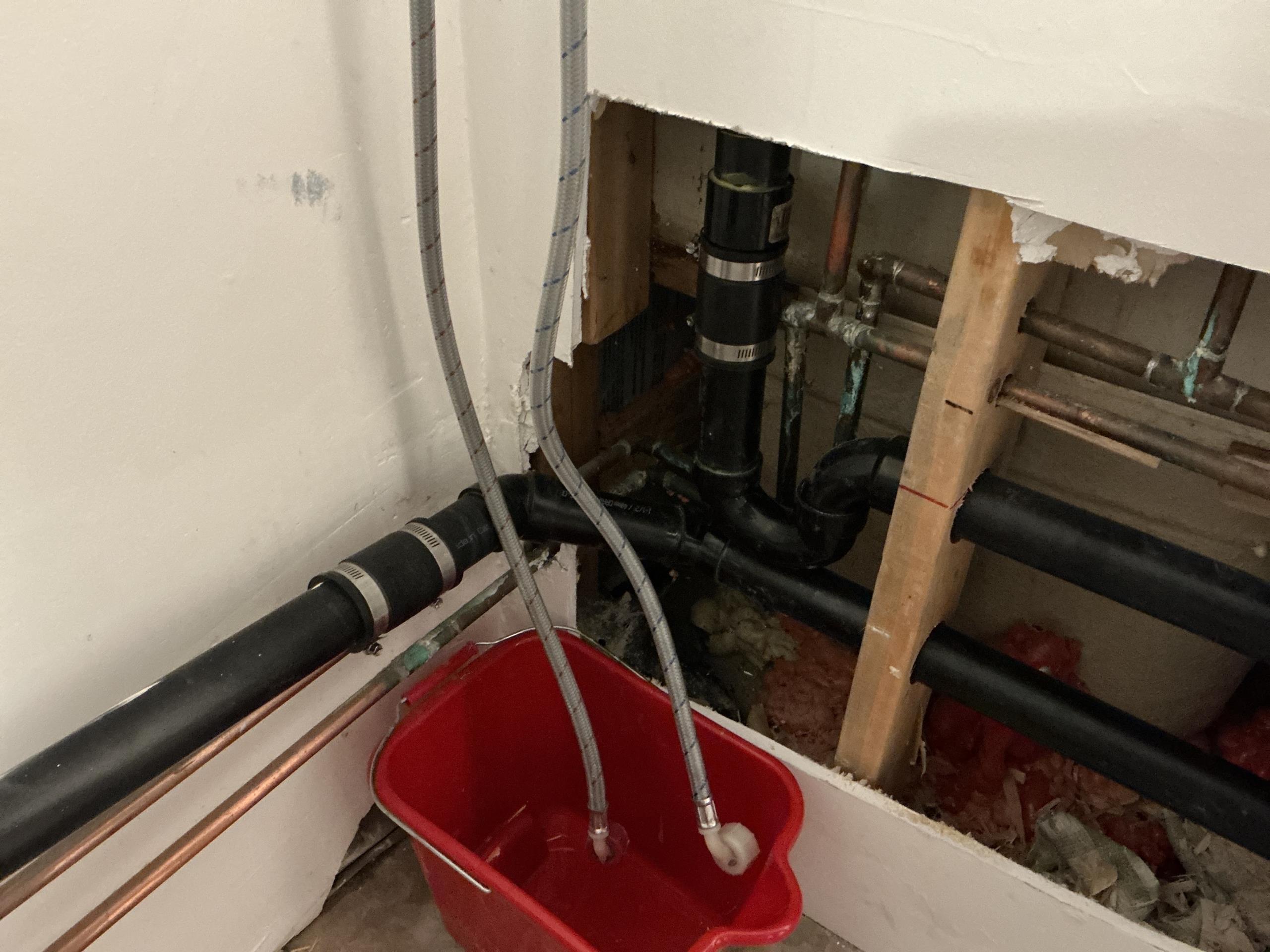 Old Toronto, ON - Reconfigure laundry drain for better flow