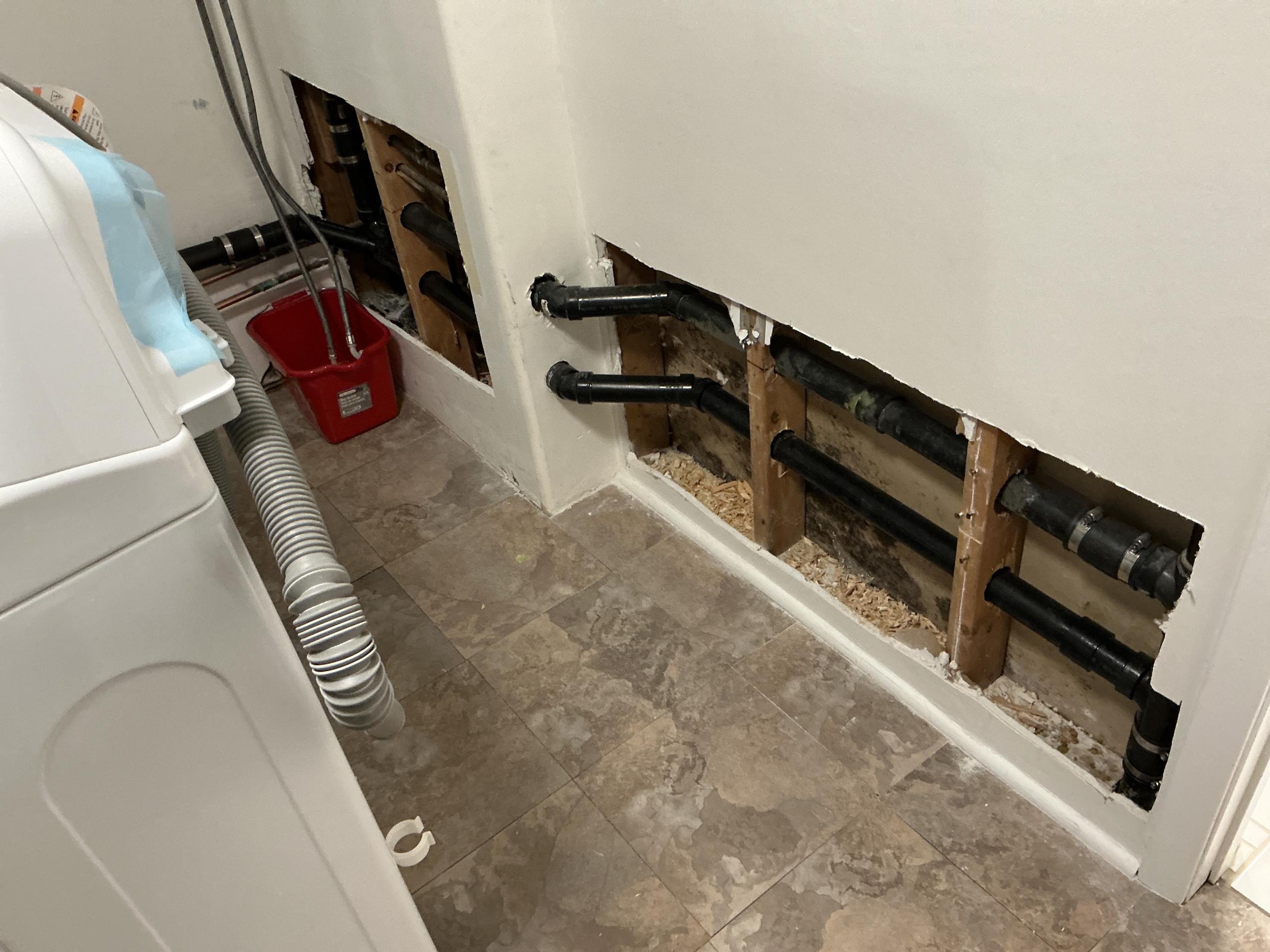 Old Toronto, ON - Reconfigure laundry drain for better flow