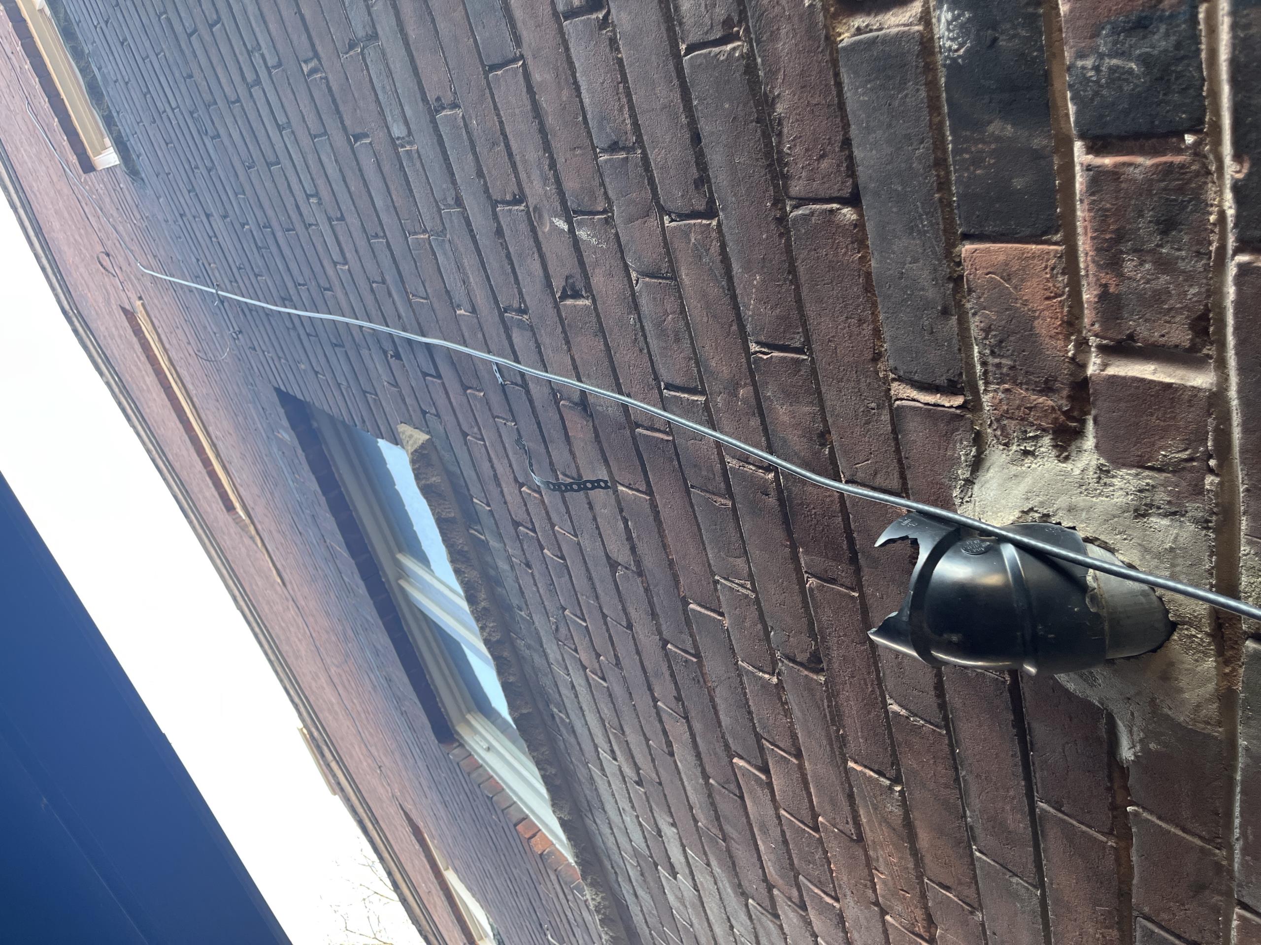 Old Toronto, ON - Sanitary vent broke off from side of house. Old Toronto, ON - Sanitary vent broke off from side of house.