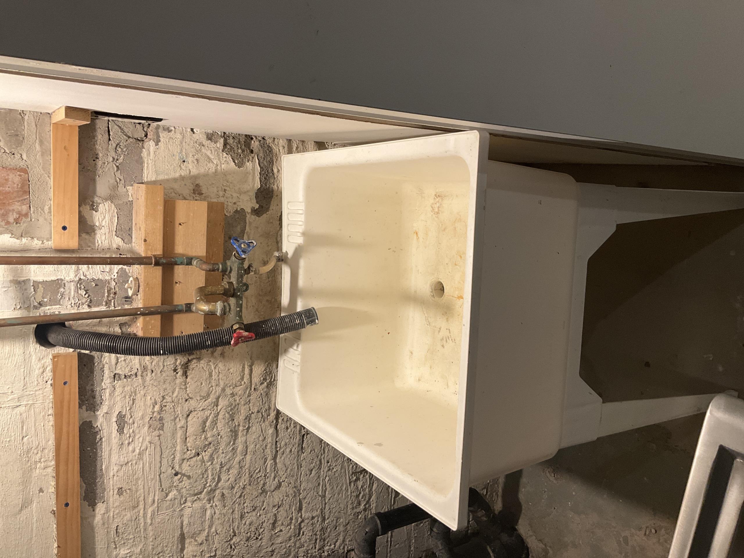 Old Toronto, ON - Replaced existing laundry sink