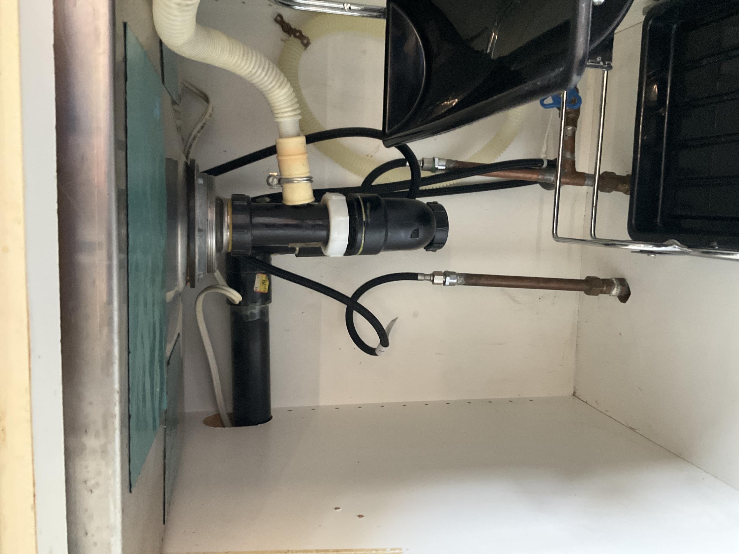 Old Toronto, ON - Augered kitchen sink and unclogged bathroom vanity