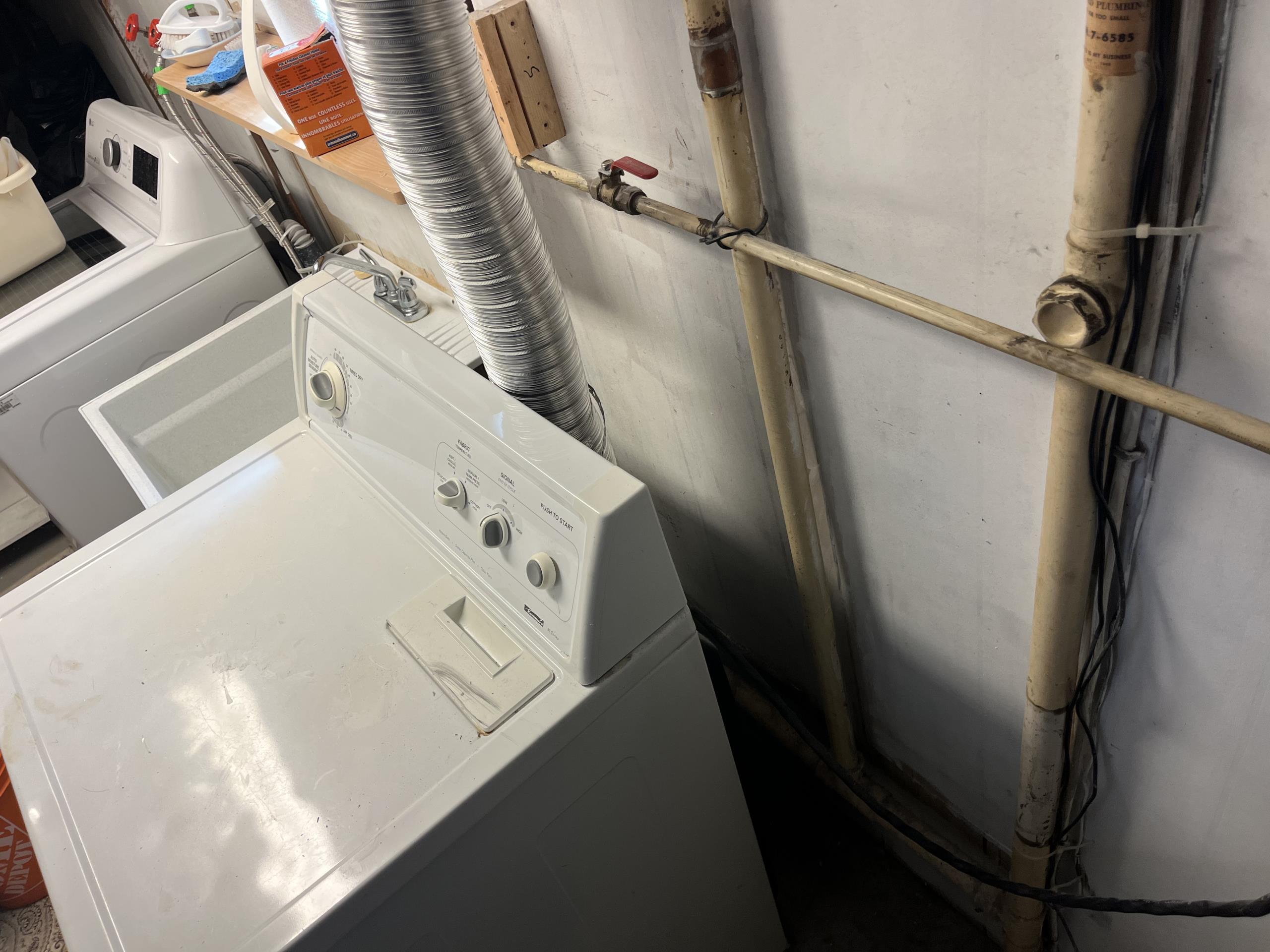 Scarborough, ON - Snaked laundry tub drain to clear blockage