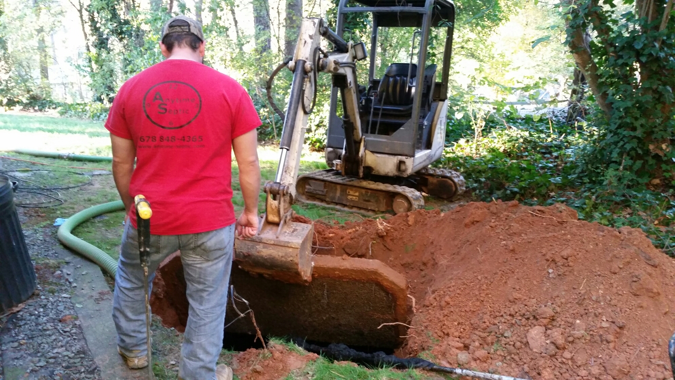 Pumped out a 1500 gallon septic tank and jetted inlet line to clear blockage