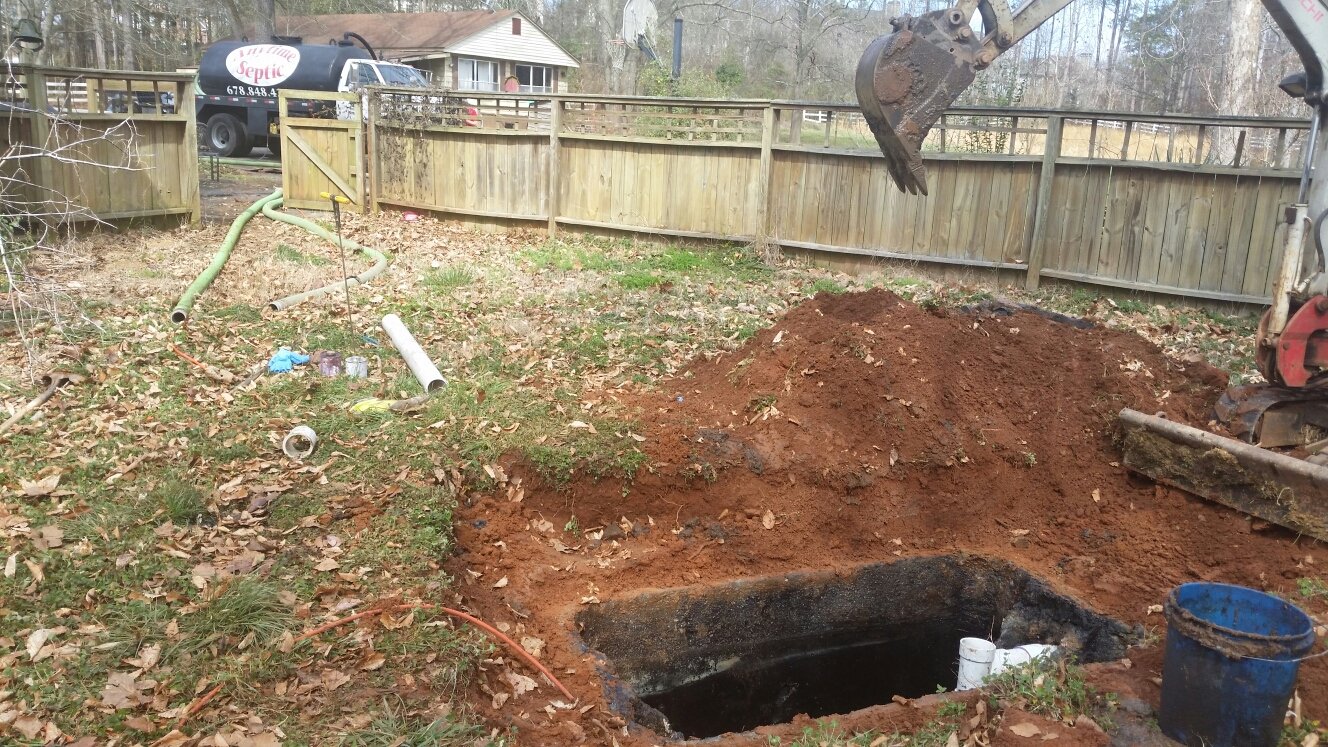 Pumped out a 1000 gallon septic tank, jetted lines, installed new outlet tee baffle 