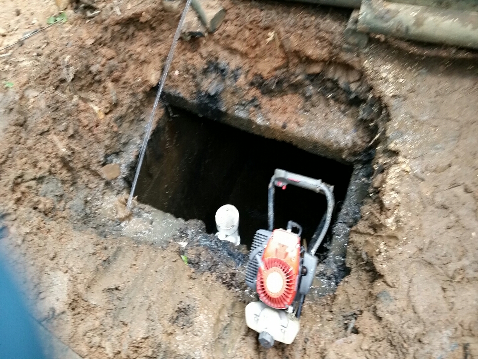 Pumped out a 1000 gallon septic tank and replaced outlet tee and did a field line treatment