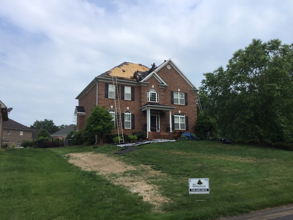 Getting the roofing shingles torn off on our roof replacement for today, we are removing a 25 year three tab shingle and installing a Owens Corning Tru Definition Duration architectural roofing shingle. This roof is approximately 27 square and we will be completed this job today.