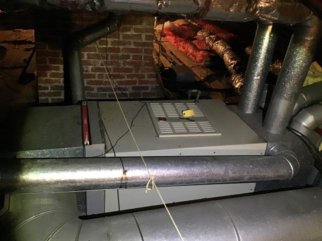 Performing a Spring Tune Up & Safety Check performed on the Customer's 1989 Bryant Heat Pump Unit.
