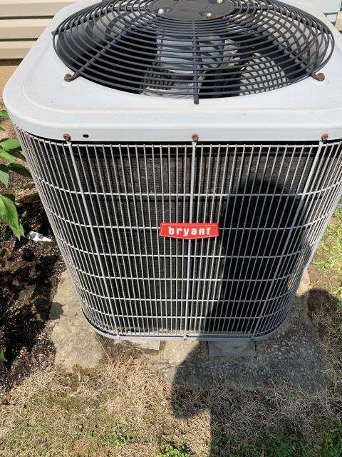 I performed diagnostic on Bryant Air Conditioning Unit. I determined that system was freezing up due to dirty filter and age of system. I changed filter, cleaned & rinsed coils. System is running and cooling now.