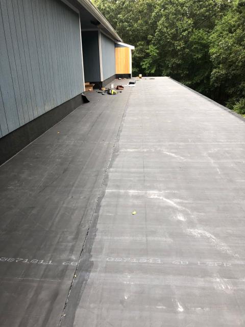 North Kingstown, RI - Installing a new EPDM rubber roof over new tapered insulation board in North Kingstown RI North Kingstown, RI - Installing a new EPDM rubber roof over new tapered insulation board in North Kingstown RI