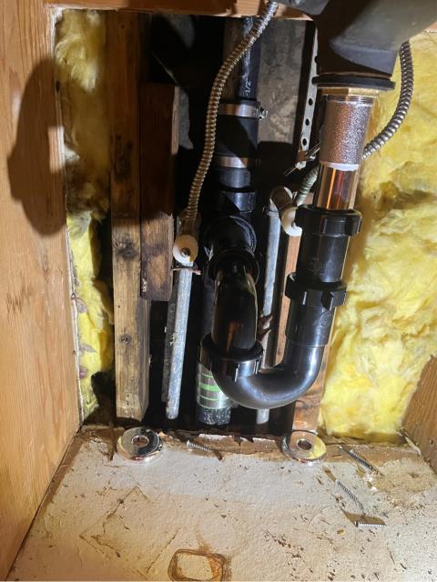 Wood floors discolored and warping by bathroom. Removed wood panel under right side bathroom sink and found abs vent broken at tee.
Cut out existing tee and replaced with new one. replaced p-trap & pop-up that broke at threads as well with new ones. 