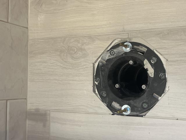 I installed the new American standard elongated toilet in the master bathroom and dapped it, also installed a new supply line