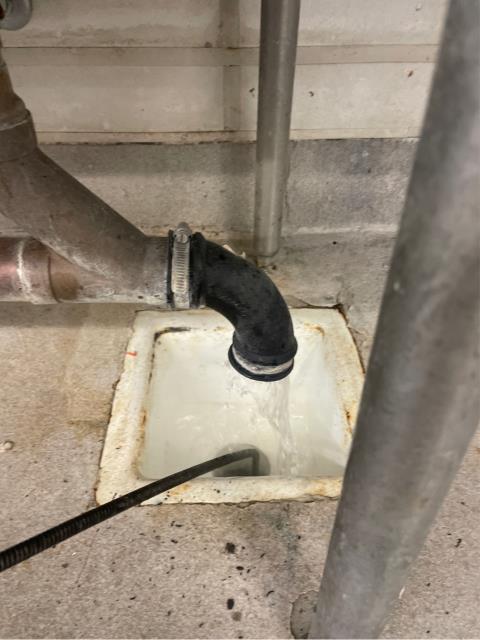 Unclogged 4 floor drains all in same drain, snaked through floor drain located in the middle of floor, pulled out plastics and mop strings. Tested properly after running faucet for 15 minutes.