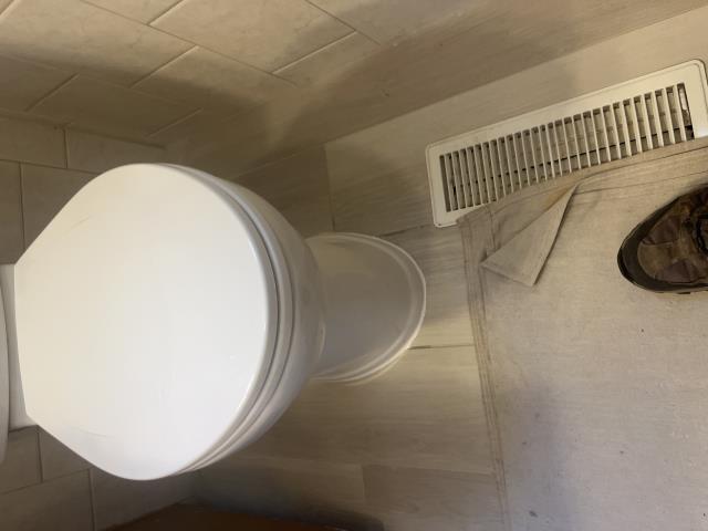 I installed the new American standard elongated toilet in the master bathroom and dapped it, also installed a new supply line