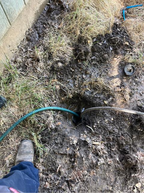 Arrived to find mainline backed up towards street 
Ran mainline cable down clean out 
Ran cable 5 feet to get line cleared 
Ran cable out 20 feet before pulling back roots on cable and blade 
Ran water down clean out to test 
Flushed toilets to test 
The mainline is functioning properly at this time 
