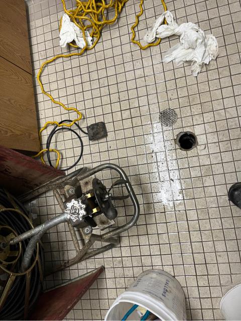  Ran a mainline snake with a 3” grease cutting double blade into the 3” clean out in the floor of the employee restroom. 
  Got the line to flow about 30-40 feet into the line. Didn’t pull anything back on the blade or cable. 