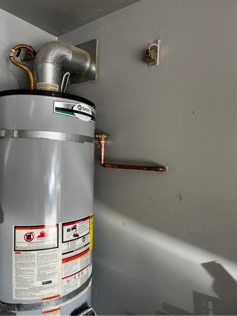 I was called to fix a leaking water heater. The original installation was faulty, and there was no shutoff on the cold side inlet. I turned off the water to the house, drained the tank, and accessed the t&p valve. I installed a 3/4 ball valve and flex line on the cold side and replaced the faulty t&p valve. I turned the water back on, lit the pilot, and checked for leaks.