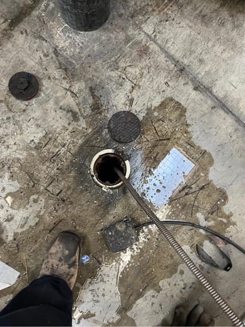Arrived to find floor drains in deli backed up 
Ran kitchen cable down floor drains in deli but was unable to clear line
Pulled cap off clean out in warehouse left of deli 
Ran 3" double blade cable down clean out
Ran cable 12 ft to get line cleared-Worked spot multiple times 
Ran cable out 30 ft before pulling back grease on cable and blade 
Ran water to test; the floor drains are functioning properly at this time.