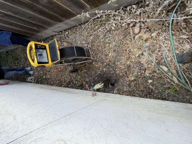 Arrived on property ran camera through sewer line found 2 belly areas we marked it on the camera video how far in the sewer line were the belly’s  was at. Also located a spot on sewer line were it was not round it was not to bad. It was in the kitchen area on the left side of sink. Ran camera all the way to the city sewer main. The sewer over all looks pretty good.