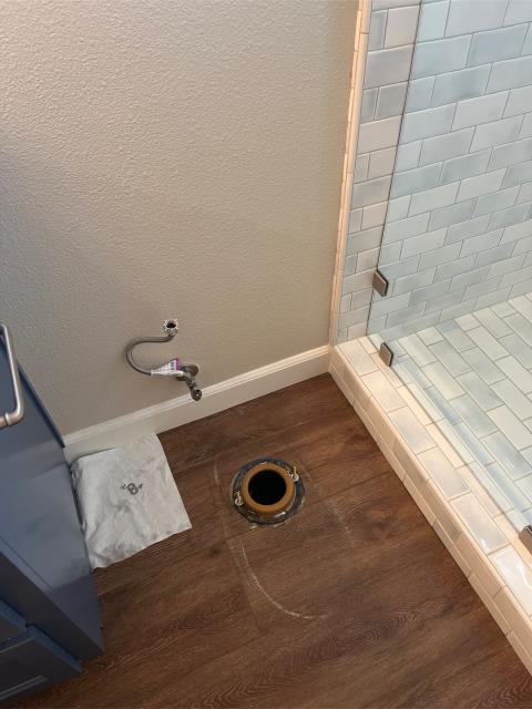 I installed a new toilet in the guest hallway bathroom. It was a straightforward job, and there were no leaks.