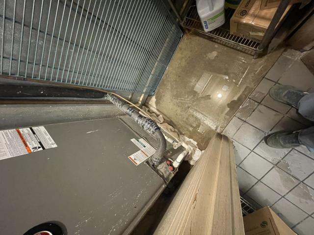 I arrived at the property and found a clogged drip line on the a/c unit. I used an air gun to clear the clog. I also found three comp commercial sink leaking from the seal. I will need to order out part & replace the seal when they come in.