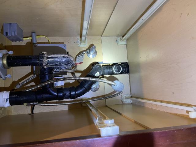 I arrived at the property and found the kitchen sink clogged. I used a kitchen snake to clear the clog, which was about 20 feet out. I tested both kitchen sinks and everything is working properly now.