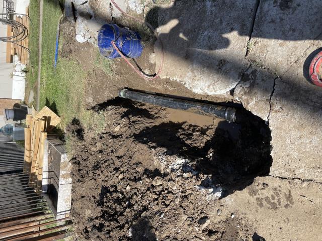 I repaired a broken sewer line for the left side units. I had to dig up and jackhammer concrete to get to the broken pipe. I dug up to where there was good pipe and removed the old pipe. I installed a new pipe and tested the line. There are no leaks, and the line is flowing good. I also snaked out the mainline for the units on the right side.