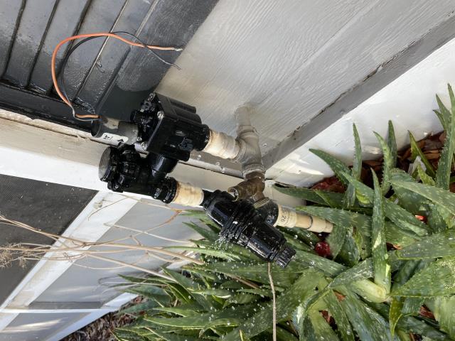 I arrived at the property and found a sprinkler valve leaking and snapped going into the ground. I removed the sprinkler valve and put a 3/4 ball valve with a galvanized plug. I turned the water back on and tested all the faucets and sprinklers, and everything is working properly.