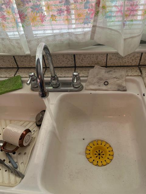 Arrived on property and found the kitchen faucet spout leaking from a bad o-ring. Replaced o-ring, tested for proper function, good, no more leaks found.