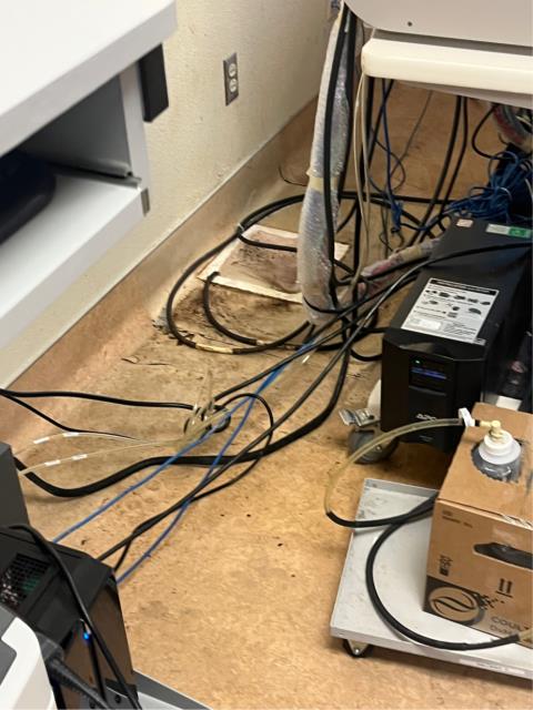  Ran a junior snake into one of the clogged floor sinks and got both of them to drain down about 50 feet into the line after getting stuck in the line multiple times. 
 Pulled back thick brown rusty sludge on the blade and cable multiple times before the line unclogged. 
  Ran water into the drains to test. They’re draining at this time.  
