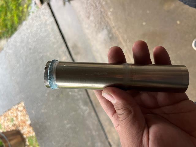 I repaired a pop-up tail piece, which was not fully tight. I removed and replaced the tape and pipe dope, and tested it to ensure it was working properly.