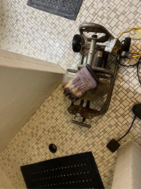 Arrived to find all 4 showers draining slowly. 
  Ran a junior snake into all 4 shower drains they wanted snaked. 
  Pulled back hair from the first one.  The rest didn’t have much hair in the drains at this time. 
  Ran water into all 4 shower drains to test. They’re all draining without issue at this time.