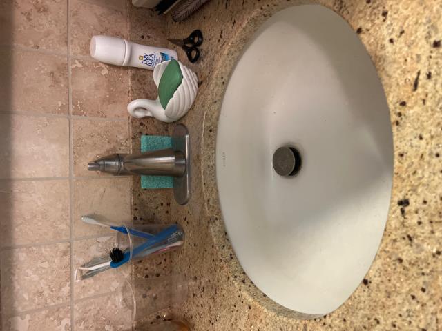 I was called to fix a low-pressure issue in a master bedroom bathroom sink. I removed the aerator and found sand in it. I flushed out the hot and cold sides and everything was good. I tested it again and it was working fine.