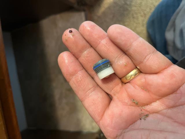 I was called to fix a low-pressure issue in a master bedroom bathroom sink. I removed the aerator and found sand in it. I flushed out the hot and cold sides and everything was good. I tested it again and it was working fine.