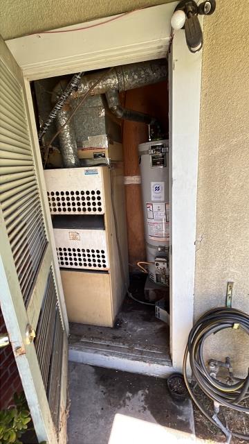 Arrived on property to find a wet spot in the water heater AC closet next to main entrance door. Walked through whole area to find no plumbing leaks. Opened AC unit panel and found internal leak coming from the AC unit itself. AC unit company will need to repair it.