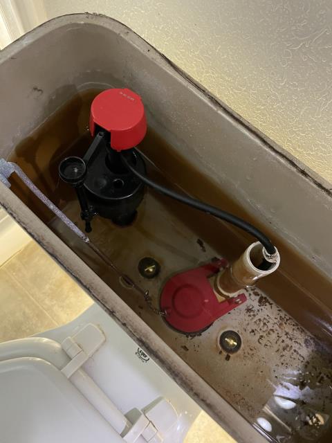 Arrived to property and found kitchen sink clogged. Has clean out on back side wall , used kitchen snake to clear line . Ran whole cable 3 times and cleared line , tested and sink is working properly at this time. Also customer wanted us to check bedroom bathroom toilet and found fill valve leaking , flapper worn and tank to bowl bolts were worn and rusted. Changed out fill valve , flapper and tank to bowl . Tested and all is working properly at this time.