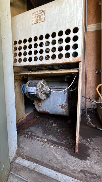 Arrived on property to find a wet spot in the water heater AC closet next to main entrance door. Walked through whole area to find no plumbing leaks. Opened AC unit panel and found internal leak coming from the AC unit itself. AC unit company will need to repair it.