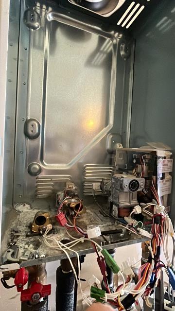 INSTALLED HEAT EXCHANGER. REMOVED OLD LEAKING EXCHANGER AND INSTALL NEW ONE THEN TESTED FOR LEAKS AND OPERATION 
I also cleaned out the burner and the gas manifold of corrosion. The water heater is working now 