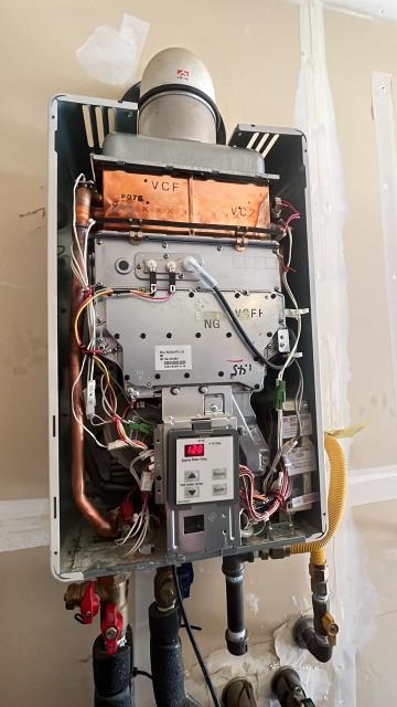 INSTALLED HEAT EXCHANGER. REMOVED OLD LEAKING EXCHANGER AND INSTALL NEW ONE THEN TESTED FOR LEAKS AND OPERATION 
I also cleaned out the burner and the gas manifold of corrosion. The water heater is working now 