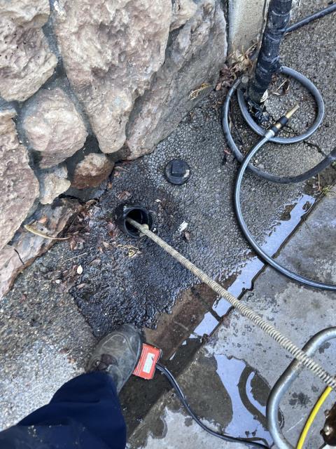 Upon arrival, technician made contact with owner. Technician was directed to 4 inch ABS cleanout located in the back of units.
Technician utilized 7/8 cable in order to clear at 75 feet. Nothing was retrieved at the end of cable however technician did see 1 inch PVC pipe in line technician attempted to remove, however was unsuccessful.
Technician then moved on to apartments right next-door. Cleanout was located in front of units in parking lot. Technician ran cable for 30 feet. Technician did not retrieve nothing at the end of cable but grease. There is another clean out located in the far left corner of units at the fence mark.