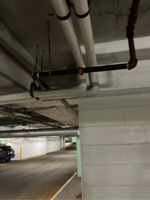 We recently replaced several sections of corroded pipe and fittings on a dry fire protection system serving a parking garage. The system had developed leaks due to corrosion of the pipes, which can severely impact its reliability in an emergency.

Our team removed the damaged components and installed new piping to restore system integrity and ensure continued NFPA compliance.
