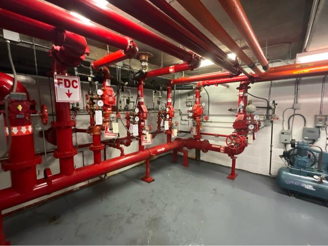 We recently completed a full NFPA 25 annual inspection for a large commercial building. The scope included one wet fire sprinkler system, four dry systems, a standpipe system, and an electric fire pump—all thoroughly inspected and tested for functionality and code compliance.