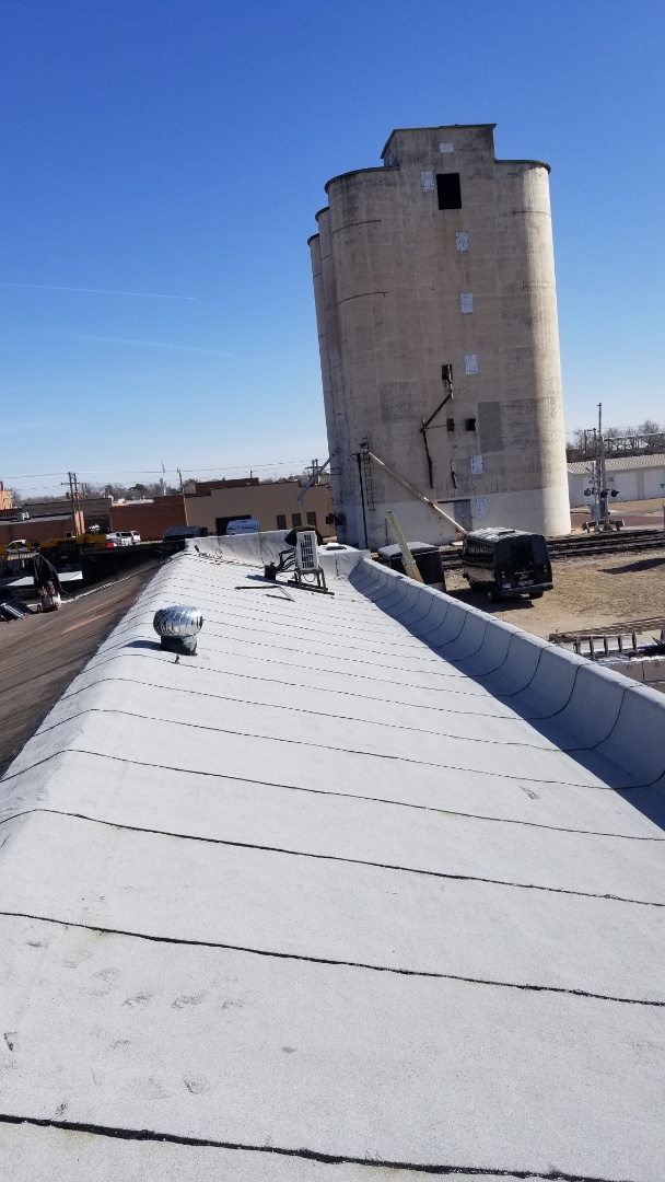 Hays, KS - Torch grade modified roof repair done by Roofmasters Roofing and Sheet Metal. Hays, KS - Torch grade modified roof repair done by Roofmasters Roofing and Sheet Metal.