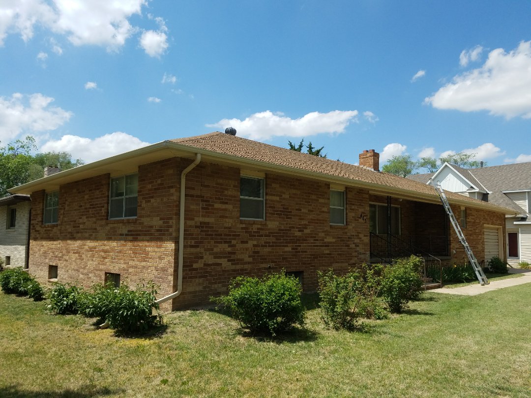 Phillipsburg, KS - Inspecting a roof for the new homeowner on this ranch style home. Phillipsburg, KS - Inspecting a roof for the new homeowner on this ranch style home.