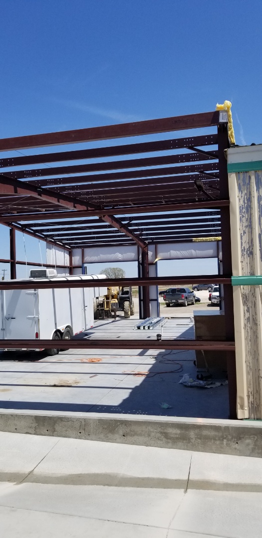 Hays, KS - New steel building addition at D&L body shop. #roofmasters Hays, KS - New steel building addition at D&L body shop. #roofmasters