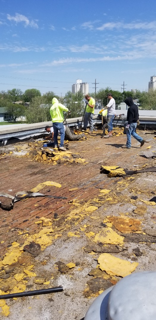 Hays, KS - Nasty rusted steel decking with fiberglass tear off. New roofing was way overdue. Hays, KS - Nasty rusted steel decking with fiberglass tear off. New roofing was way overdue.